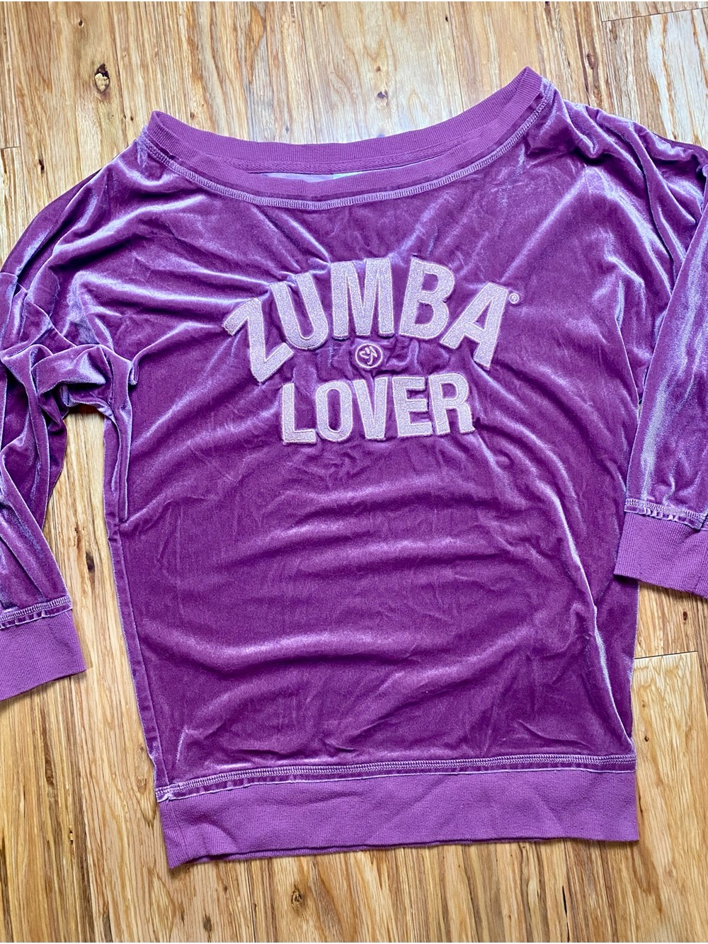 Zumba Fitness Off-the-Shoulder Velvet Sweater in Purple